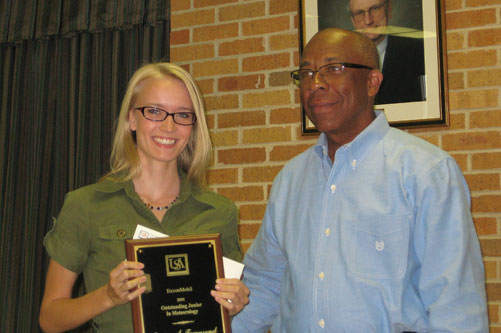 Jessica Townsend receives the 2011 ExxonMobil Scholarship Award from Richard Benjamin of ExxonMobil.