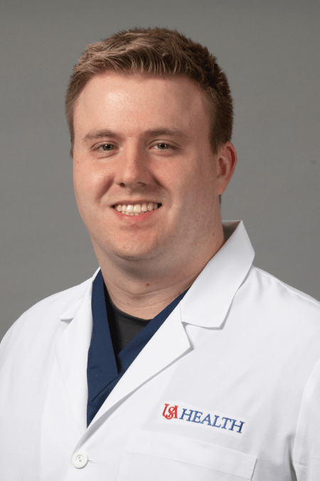 Mark Slusher, M.D.