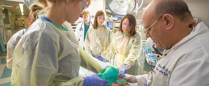 Nurses working with doctor in surgery room