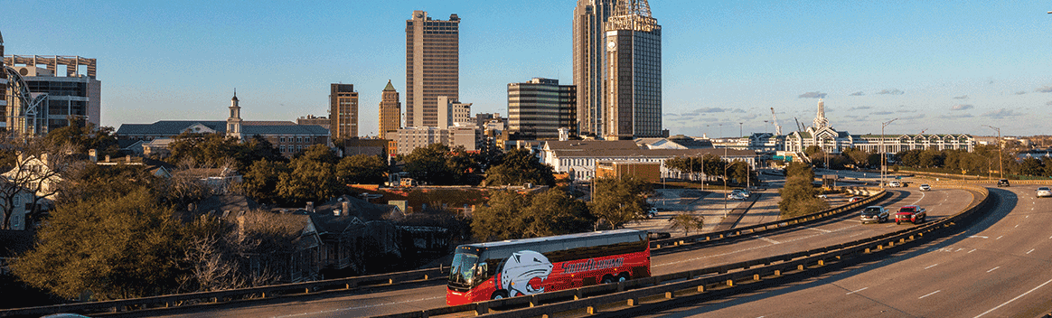 South Alabama Jags Bus going across Mobile, Alabama's interstate near downtown Mobile.