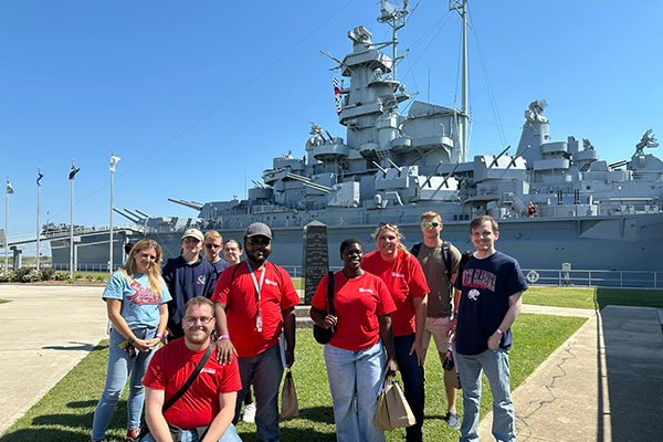 Group photo from the Your Career, Your City trip to the U.S.S. Alabama Battleship