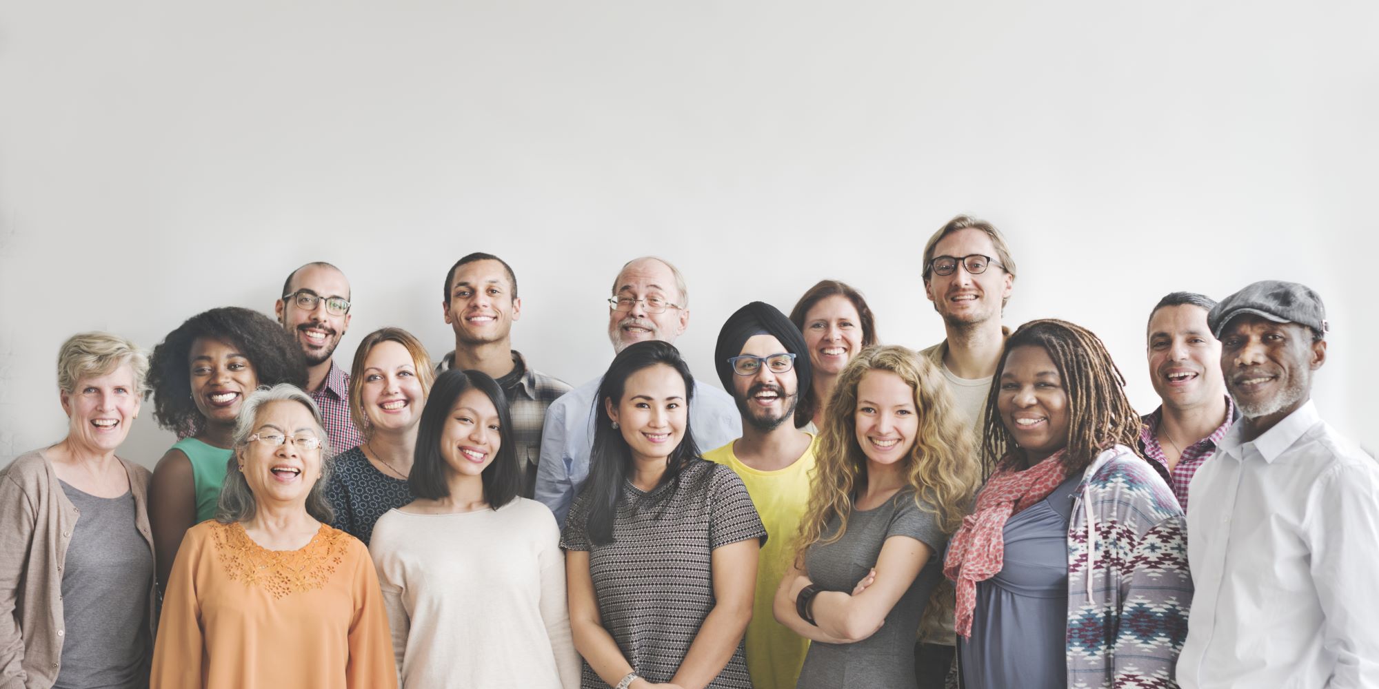 group of people standing together looking at the camera