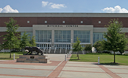Outside of Mitchell Center with Jaguar statue.
