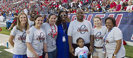 Empowering Change staff at a football game