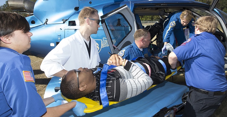 South students in the emergency medical services program load a "victim" onto a helicopter for treatment at a local hospital during an annual disaster drill held Thursday on campus.
 data-lightbox='featured'