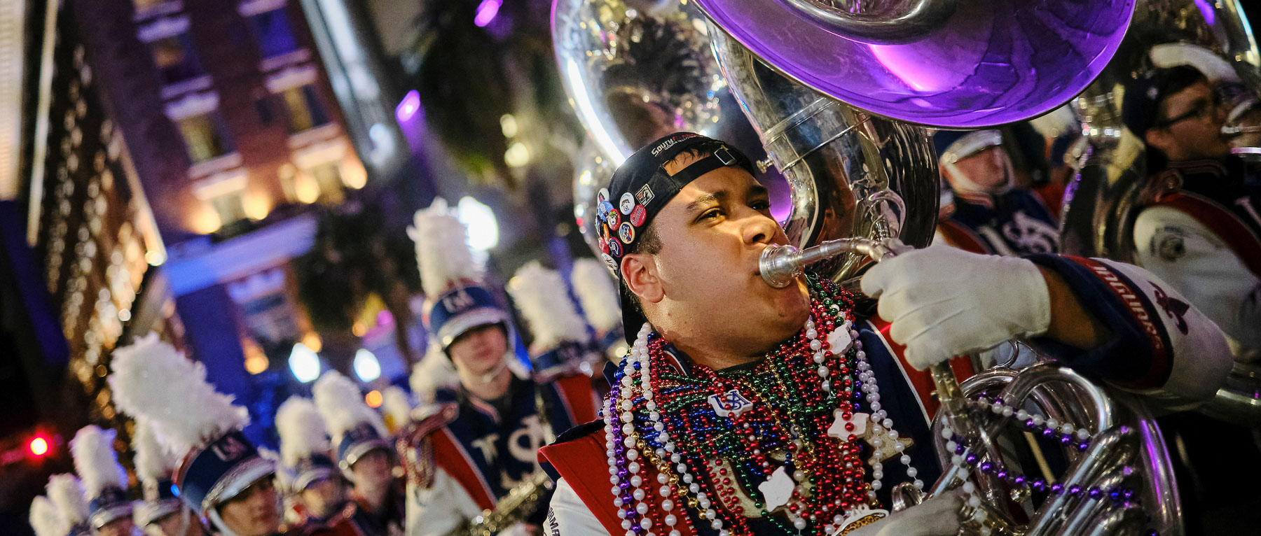 The Jaguar Marching Band marching with the Conde Cavaliers in downtown Mobile on Friday, Feb. 14, 2025.