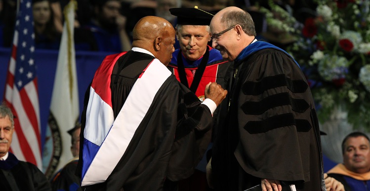 U.S. Rep. John Lewis was the commencement speaker for the University of South Alabama's 2015 Fall Commencement. He is joined on stage, from left, by Dr. Tony Waldrop, USA president, and Dr. David Johnson, provost and senior vice president for academic affairs. data-lightbox='featured'
