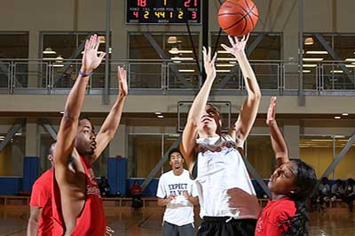 Students playing intramural basketball.