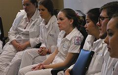 Group of nurses sitting in chairs